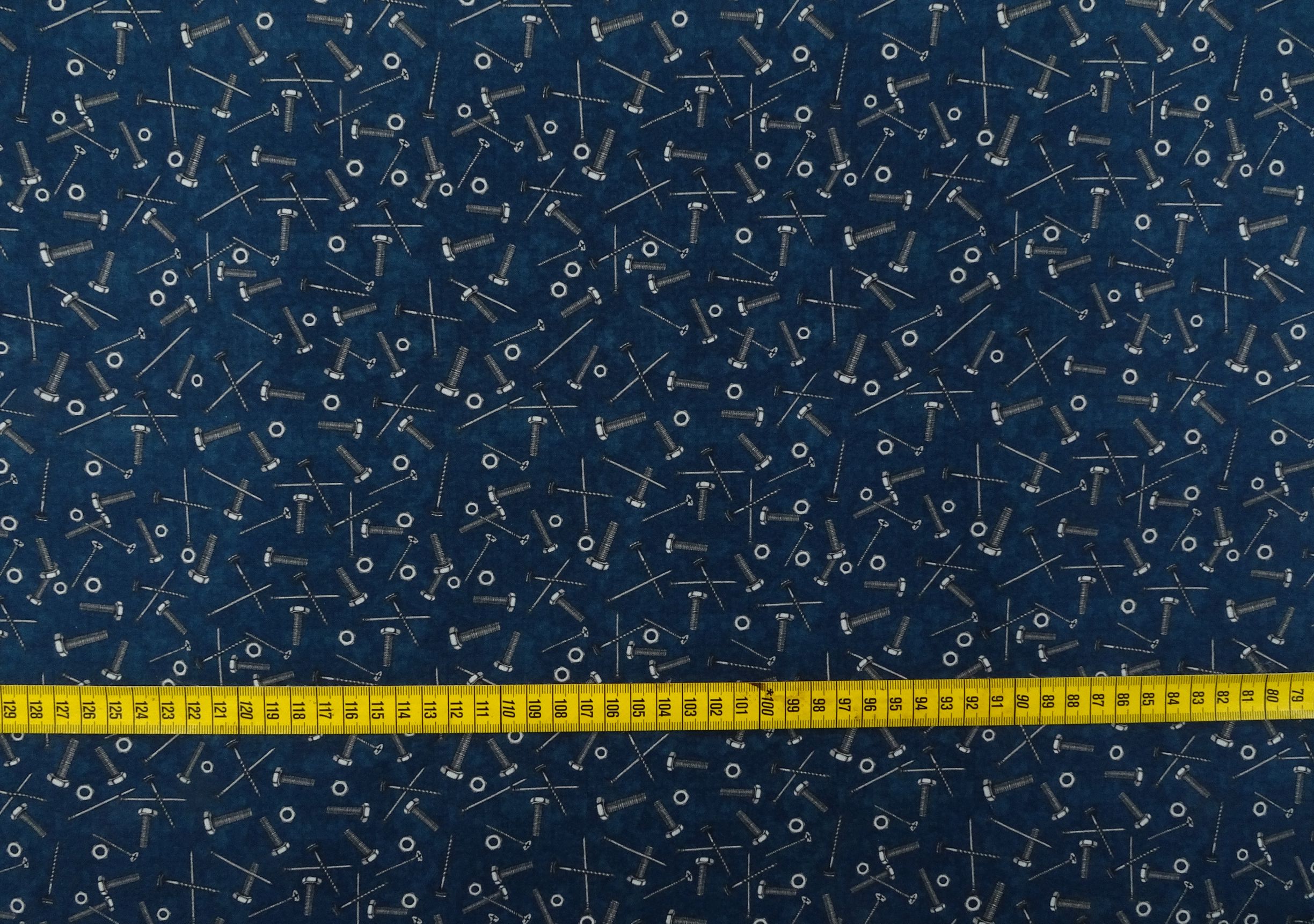 Patchworkstoff - Schrauben Nägel dunkelblau